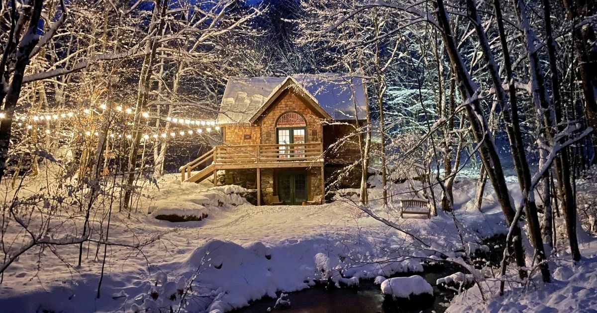 Vermont storybook cottage in the snow.